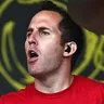 Chuck Comeau Drummer voice for text-to-speech